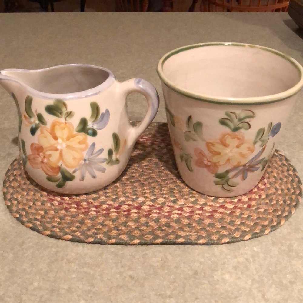 Pitcher and planter/utensil holder combination.